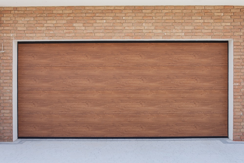 A closeup shot of brown sectional garage doors
