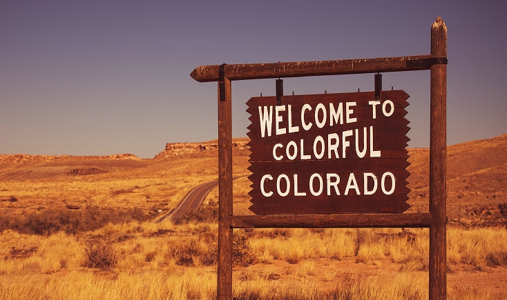 A wooden sign reading
