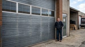 mad beside a commercial garage door