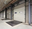 commercial garage door maintenance on warehouse