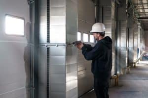 technician commercial garage door maintenance